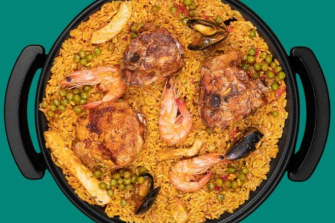Paella vlees vis eten bestellen ameland pan